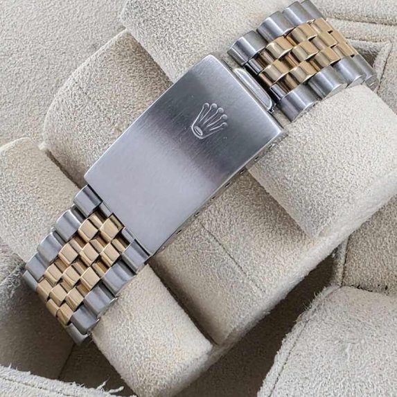12633